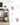 Birou cu 2 rafturi reversibile, cadru din otel, picioare reglabile, 120x60x75 cm, maro rustic si negru