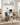 Birou cu 2 rafturi reversibile, cadru din otel, picioare reglabile, 120x60x75 cm, maro rustic si negru