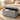 Taburet pliabil cu sezut moale, spatiu de depozitare, maxim 300 kg, 76x38x40 cm, gri deschis